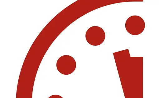 The Doomsday clock, the logo of The Bulletin of the Atomic Scientists, showing two and a half minutes to midnight.
