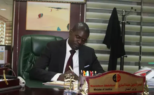 Sudanese Minister of Justice Nasredeen Abdulbari at work. Image by Rebecca Hamilton. Sudan, 2019.