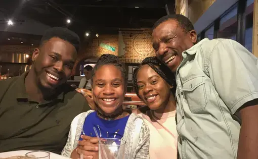 Errol Wray Jr. (left) with his two younger sisters and his dad Errol Wray Sr. during a family night out in New York City. Courtesy Errol Wray Jr.