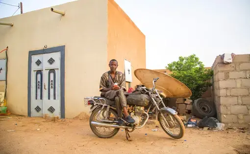 Khalid was about to move to Europe until he realized just how much money he could make by staying. Image by Emily Kassie. Niger, 2016.