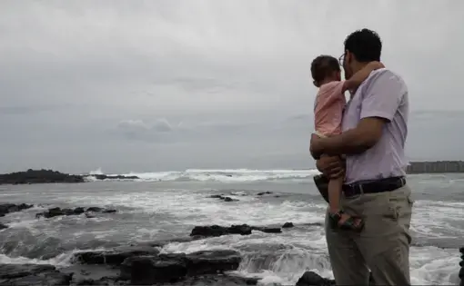 Salem with his son Hamza in Jeju Island. Image by Saad Ejaz. South Korea, 2019.