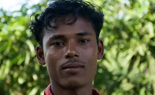 Rohingya guitarist and mandolin-player Mohammed Alom left Myanmar for Malaysia. Today he lives in Bangladesh's Kutupalong refugee camp. Image by Sasha Ingber/Music in Exile. Bangladesh, 2019.