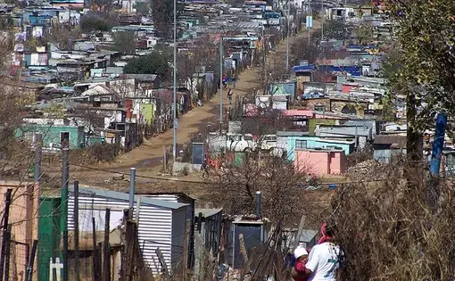 Soweto Housing, Johannesburg. Image by Kevin Gabbert/Wikimedia Commons. South Africa, 2009.