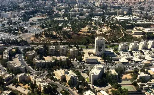 Birds eye view of homes and businesses in Israel. Image by Miriam Berger. Israel, 2014.