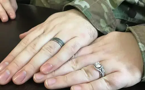 Wisconsin National Guard 1st Lieutenants Anna and Brian Kastelic are the only married couple deployed to Ukraine with a unit of 164 soldiers helping mentor Ukrainian military trainers. They met in the Guard and married in 2016. Image by Meg Jones / Milwaukee Journal Sentinel. Ukraine, 2020.