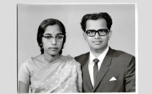 Studio photo of Indira and Bala Pillay. The Pillays lived in Singapore for a year before deciding to immigrate to the U.S. Image courtesy of Kavita Pillay/WGBH News.