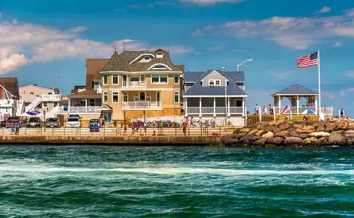 Beach houses along the inlet in Point Pleasant Beach, New Jersey. Image by ESB Professional / Shutterstock. United States, undated.