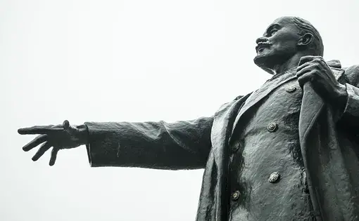 Monument of Lenin stretching his hand in Narva, Estonia. Image by valeriiaarnaud / Shutterstock.com. Estonia, 2014.