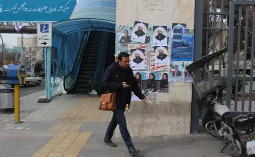 Many Tehran residents ignored the campaign posters and stayed away from the polls. Only 25 percent of Tehran residents voted. Image by Reese Erlich. Iran, 2020.