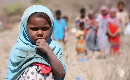 A displaced Yemeni girl in the al-Dashin camp of the Taiz governorate. Image by Ahmed al-Basha/IRIN. Yemen, 2016.