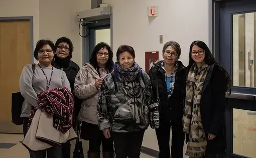 Daniella Zalcman (far right) with a group of survivors in University of Regina. Image by Keith Adolph. Canada, 2017. 