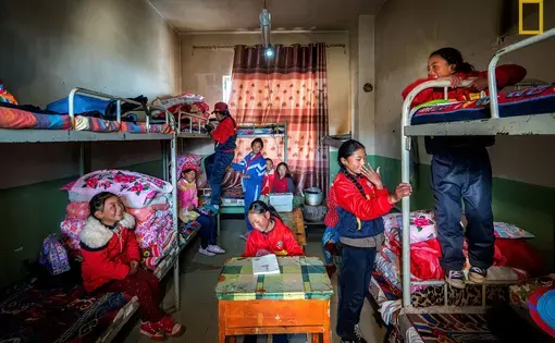 “Far away from the nearest modernized city in Qinghai, I traveled with Oxfam for about 10 hours to visit the Tibetan students staying in this boarding school. Instead of rushing back to their room after lunch to play with their smartphone or tablet, these kids are finding a suitable place in this small room packed with eight students so they can take out their books and start studying.” Image by Antonio Leon, National Geographic Your Shot. China, 2017.