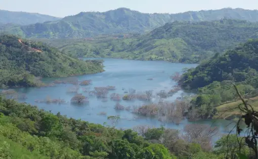 The reservoir created by the Barro Blanco hydroelectric dam extends miles upstream, flooding houses and farmland of the Ngäbe-Buglé people.
