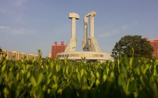 In Pyongyang, North Korea, a view of the towering monument dedicated to the symbol of the Workers Party of Korea. Image by Laya Maheshwari. North Korea, 2018. In Pyongyang, North Korea, a view of the towering monument dedicated to the symbol of the Workers Party of Korea. Image by Laya Maheshwari. North Korea, 2018.