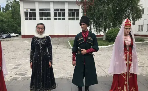 Young Circassians in formal dress in Terek. Image by Ben Mauk. Russia, 2019.&nbsp;