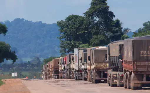 Trucks carry soy, corn, and beef along one of the main highways cutting across the Amazon basin. Much of these food commodities are bound for China. Image by Heriberto Araújo. Brazil, 2019.