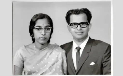 Studio photo of Indira and Bala Pillay. The Pillays lived in Singapore for a year before deciding to immigrate to the U.S. Image courtesy of Kavita Pillay/WGBH News.