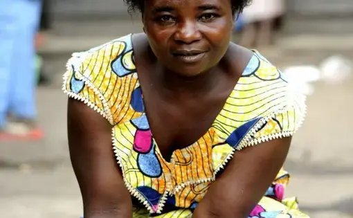 Masika Katsuva is a central figure in the Pulitzer Center-supported documentary "Seeds of Hope." She created a support center and farming community in the Democratic Republic of Congo to assist other survivors of rape, their children and orphans. Image by Fiona Lloyd-Davies. Democratic Republic of Congo, 2013.