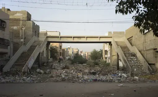 Informal housing, Footbridge near Orangi Town Station, Karachi, Pakistan. Still from KCR, 2014–2017, nine-channel multimedia installation. Image by Ivan Sigal. Pakistan, 2017.