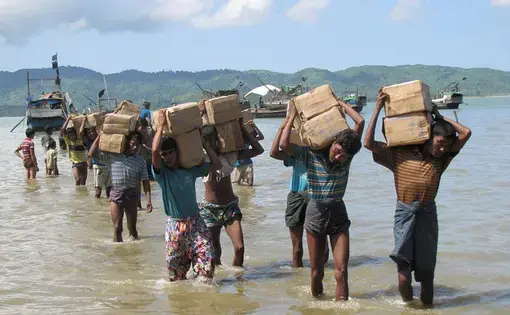 One IDP camp near Sittwe can only be accessed by sea with boats transporting vital aid supplies such as rice and cooking oil. Image by Mathias Eick (CC BY-ND 2.0). Myanmar, 2013.