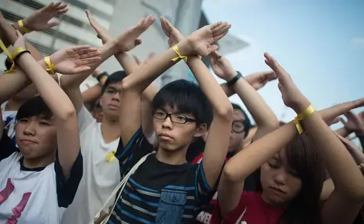 Joshua Wong (center) leading pro-democracy protests in Hong Kong. Image by Anthony Kwan/Getty Images. China, 2014.