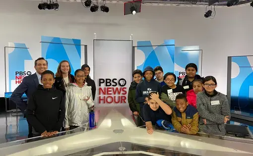Ida B. Wells Middle School students tour the PBS NewsHour studio with special correspondent Nick Schifrin. Image by Pauline Werner. United States, 2020.