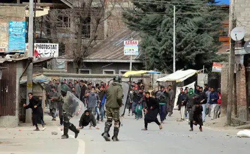 Clashes erupted after security forces killed two foreign militants belonging to the Jaish-e-Mohammad extremist group. Image by Aasif Shafi / Shutterstock. India, 2018.