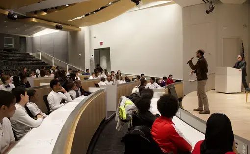 Students prepare to listen to a panel at USA Today that will discuss the importance of journalism and how newspapers and media outlets produce the news today. Image by Alyssa Sperrazza. United States, 2018.
