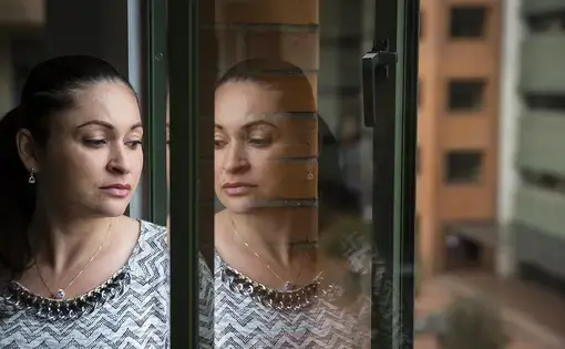 Members of Elenith's family have a mutation that causes early-onset Alzheimer's disease, but she doesn't know whether she will develop the disease. "It has haunted me all of my life but I want to be prepared if possible," she says. Image Greg Kendall-Ball. Colombia, 2018.
