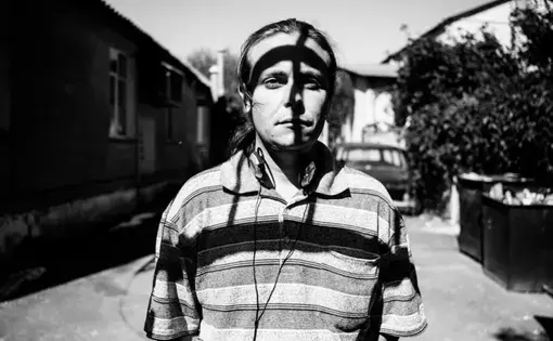 Georgiy—or Zhora, as he likes to be known—is a 28-year-old musician, who has been living in a dorm in Kiev since the summer. At first, he had to go to the clinic each day for his substitution therapy—a four-hour round trip. Image by Misha Friedman. Crimea, 2014.