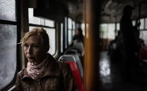 Olga on her way to a shelter for war-displaced people in Odessa. Image by Misha Friedman. Ukraine, 2016.