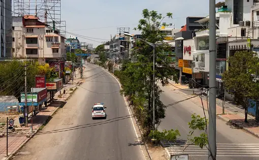 The coronavirus curfew in Bangalore: police and food delivery services are the only traffic as the country's IT hub moved to working remotely. Image by Nicolas Mirguet / Flickr. India, 2020.