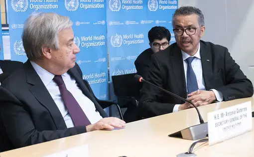 UN Secretary-General António Guterres with Tedros Adhanom Ghebreyesus Director-General of World Health Organization (WHO) during strategic briefing on COVID-19 at Strategic Health Operations Centre (SHOC) at the WHO headquarters in Geneva in February. Image UN Photo / Jean Marc Ferré. Switzerland, 2020.