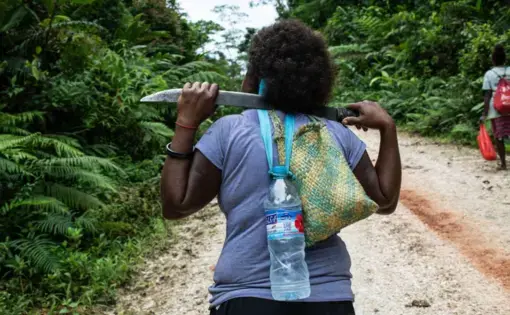 Judy Boifuana hikes in the jungle near Igwa village on the island of Malaita, Solomon Islands, September 18, 2019. Image by Thomson Reuters Foundation/Monique James. Solomon Islands, 2019.