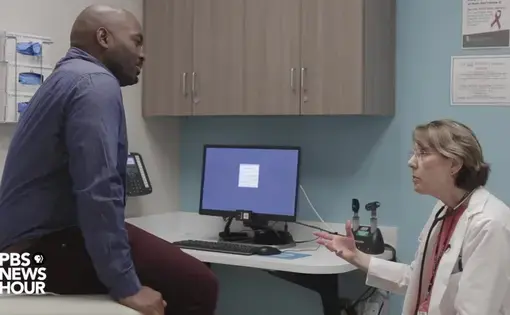 Subtle signals of a doctor’s office–the stethoscope, the white coat, the poster of the human body–and play a key role in triggering expectations. Image by Matt Ehrichs. United States, 2018.