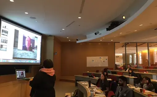 Scott Anderson presents his reporting on "Fractured Lands" to educators through Skype. Image by Fareed Mostoufi. United States, 2017.