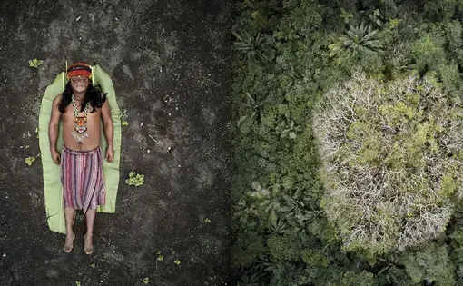 José juxtaposed with the Achuar rainforest in Ecuador. Image by Pablo Albarenga. Ecuador, 2019.