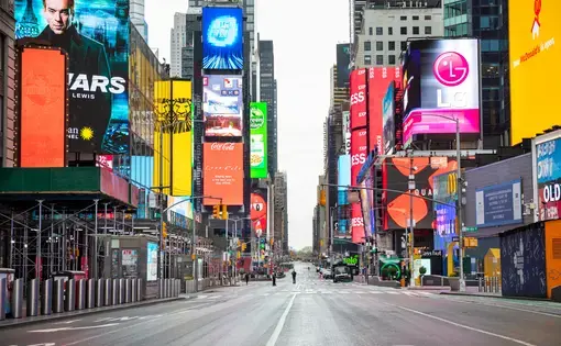 No crowds in Times Square after self-quarantine and social distancing was put in place in New York City to slow the spread of the COVID-19 pandemic. Image by Shutterstock. United States, 2020.