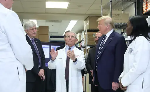 From left: VRC Deputy Director Dr. Barney Graham, NIH Director Dr. Francis Collins, VRC Director John Mascola, Department of Health and Human Services Secretary Alex Azar, President Trump, and VRC Research Fellow Dr. Kizzmekia Corbett. Image courtesy National Institutes of Health. United States, 2020.