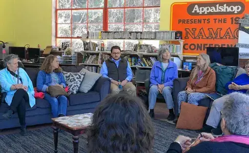 Hands Across the Hills participants from Leverett and Letcher County, Ky. share a focused discussion of issues. Image by Richie Davis. United States, 2018.