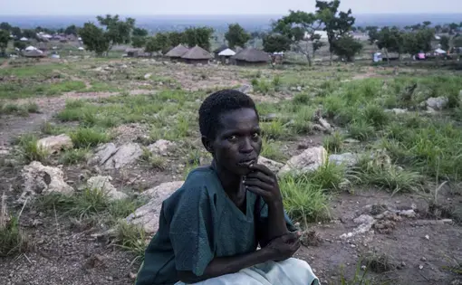 Uncertain future: Tabu Raida sits for a portrait in the Imvepi settlement for refugees that have fled from South Sudan to Uganda. Image by Adriane Ohanesian &amp; Gael Cloarec / Getty Images.