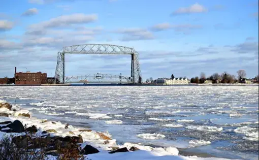 Duluth's Aerial Lift Bridge, a city landmark and passageway for ships between the city's port and Lake Superior. Image by Walker Orenstein / MinnPost. United States, undated.
