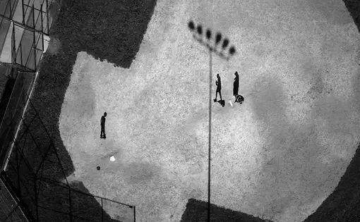 “Baseball practice in Montgomery County, Maryland. According to records obtained from the FAA, which issued 1,428 domestic drone permits between 2007 and early 2013, the National Institute of Standards and Technology and the U.S. Navy have applied for drone authorization in Montgomery County.” Image by Tomas van Houtryve. United States, 2014.