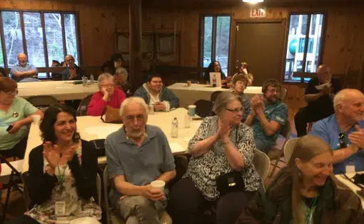 Letcher County and Leverett residents enjoy singing together at Cowan Community Center in Eastern Kentucky. Image by Richie Davis. United States, 2018.