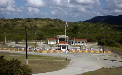 Guantanamo Bay Detention Center's Northeast Gate. Image by Sgt. Jim Greenhill/National Guard Bureau. Guantanamo Bay 2006.