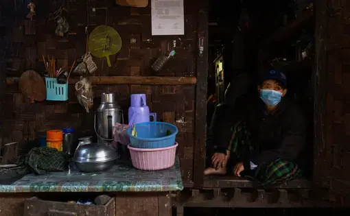 A man in his shelter in Mali Yang IDP camp in the Kachin State capital Myitkyina. Image by Hkun Li. Myanmar, undated.