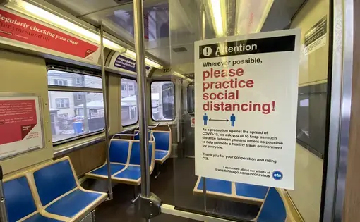 The inside of an empty CTA car. Image by Reed Mansour / Wikimedia Commons. United States, 2020.