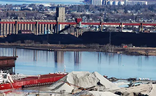 A stockpile of coal at the Midwest Energy Resources Company terminal in Superior, Wisconsin. The business is the largest mover of coal on the Great Lakes. Image by Paul Walsh. United States, undated.