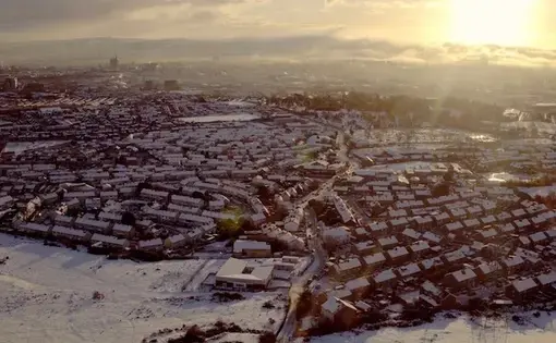 An aerial shot of Ballymurphy in Belfast. Image by Callum Macrae. United Kingdom, 2018.