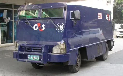 Isuzu armored truck. Flickr commons image by Davocarno. Philippines, 2014.